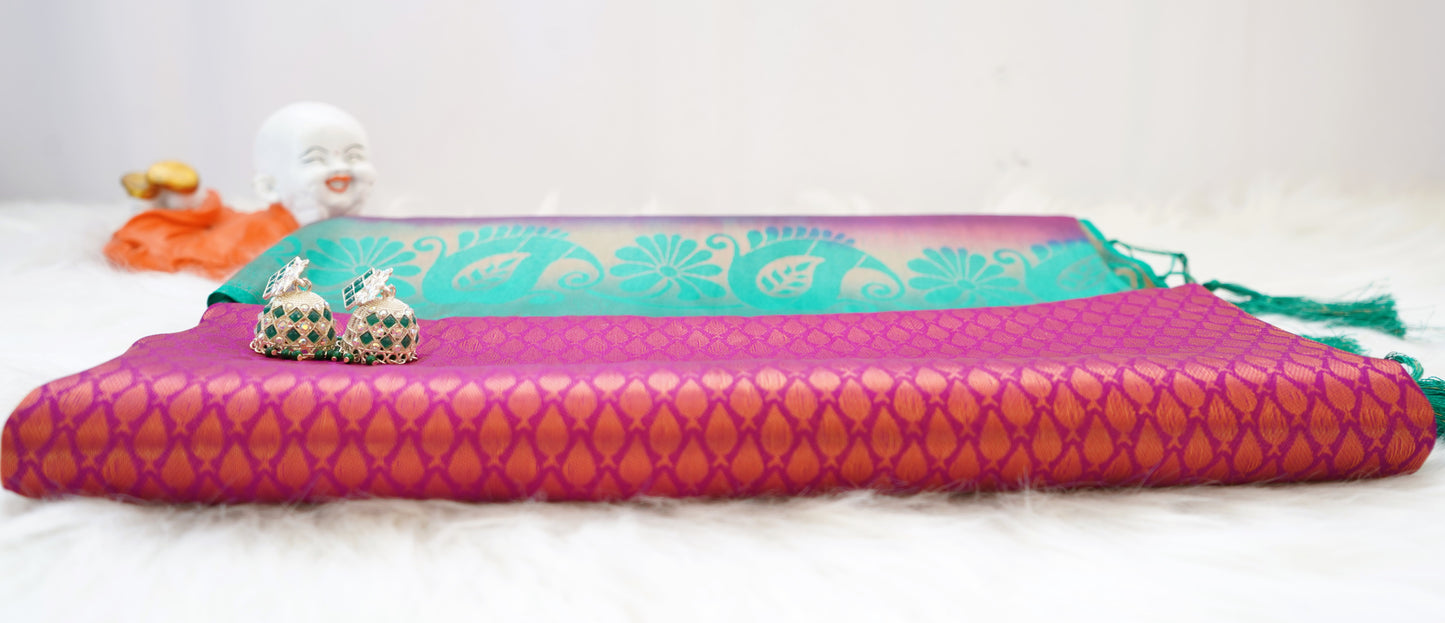 Lotus Bloom Malabari Soft Silk Saree in Magenta & Teal Green