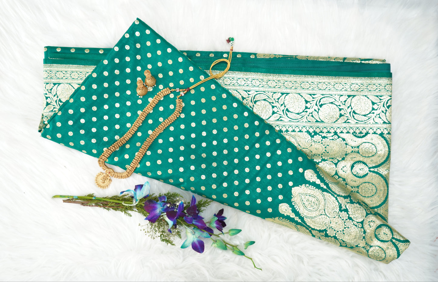 Regal Emerald Banarasi Silk Saree with Golden Buttis & Intricate Brocade Border