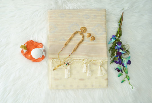 Dreamy Ivory Raw Silk Saree with Pastel Ikat Buttas & Tassel-Trimmed Pallu