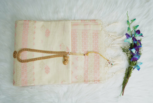 Soft Ivory Handloom Cotton Saree with Pastel Peach Ikat Motifs & Tassel-Trimmed Pallu